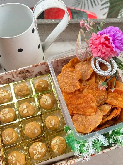 The classic Indian combination of meetha and namkeen. This hamper features my soft, desi ghee Besan Laddoos alongside our bestselling crispy and tangy Chaska Papdi. It's a simple, elegant, and delicious gift for any occasion.