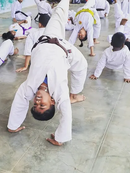 These images capture various moments from our training sessions and grading exams at different dojos, including Marathahalli and Malleshwaram, and at community events. Each picture shows the hard work and dedication that is central to our teaching philosophy.
