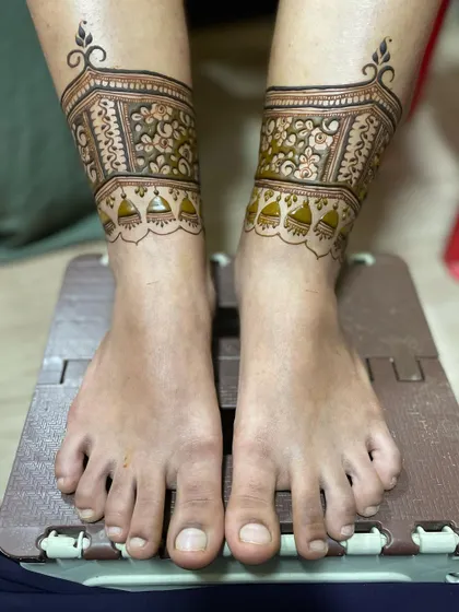 The second step in the process. After the ankle band, I added the next layer of detail, including the jhumka motifs and the floral cuff.