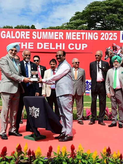 Mr. J.S. Bedi, President of the Delhi Race Club, presents The Delhi Cup to the owner of N R I Victory.