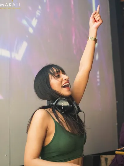 A shot of pure happiness. My arm in the air, a huge smile on my face, just loving the energy of the weekend crowd.