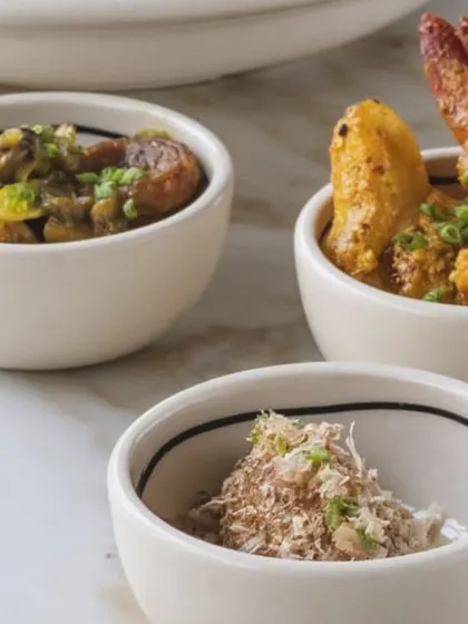 Small bowls of exquisite dishes from one of our culinary events, as featured in the press.