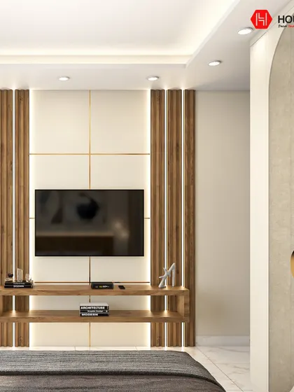 This view showcases the integrated TV unit in a modern bedroom. The vertical wood fluting and clean white panels create a harmonious look that connects with the rest of the room's design elements.