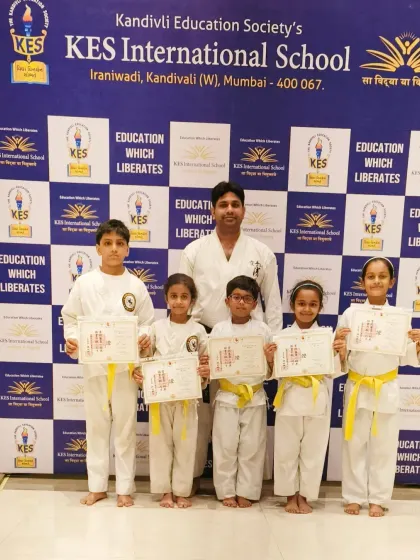 A group of my youngest students at KES International School after receiving their first karate certificates. My goal is to make learning self-defense a positive and empowering experience for children.