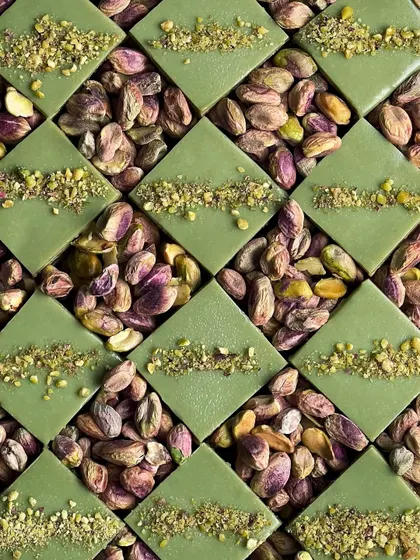 Be the sibling with the best gift this Rakhi. This is a close-up of my pistachio opera gateau, arranged with whole pistachios. The geometric pattern is so satisfying to look at, and even better to eat.