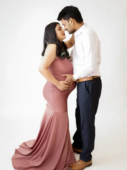 An intimate and romantic portrait of a couple. Their close embrace and loving expressions create a timeless and beautiful image.