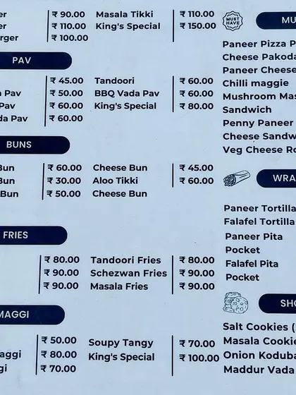 The food menu at King's Coffee Co. highlights their popular and well-priced offerings like Vada Pav, burgers, and Maggi. We help structure these successful elements into a replicable franchise model.