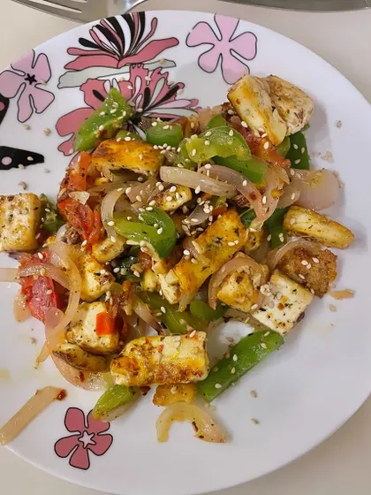 This colorful plate of sautéed paneer and vegetables is a quick, easy, and nutritious meal. Teaching your kids to cook simple dishes like this is a valuable life skill.