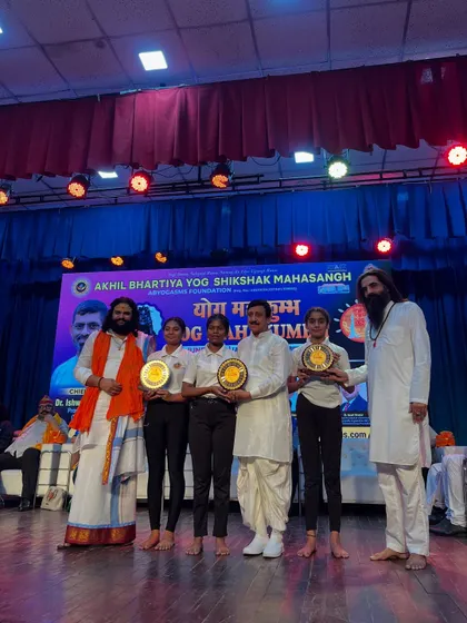 Honored to be on stage at the Yog Mahakumbh 2025, where my students were recognized for their exceptional talent and dedication.