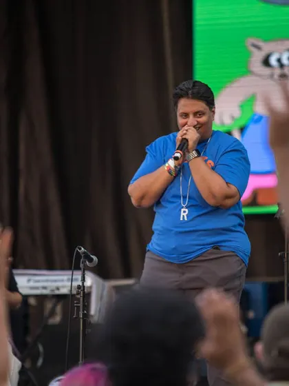 On the mic at Basement Bhangra Bacchanal, getting the crowd ready for what's next. My job is to be the host, the curator, and the guide for the night's musical journey.
