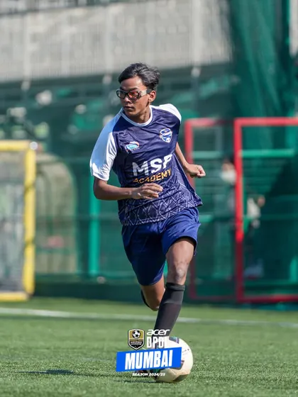 Running with purpose, a player looks for an opening to create an attack.