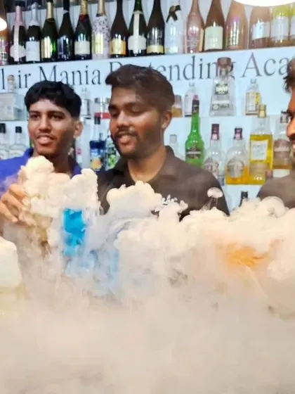 Our bartenders proudly displaying their smoky creations. We bring this excitement and expertise to every event.