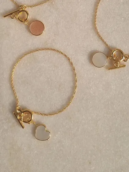 Another view of my toggle bracelets, featuring Pink Opal and Moonstone.