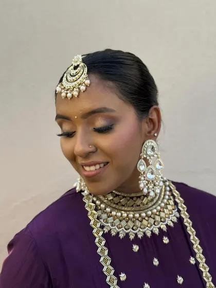 A close-up from a professional makeup and fashion shoot. Getting ready for a performance is part of the fun, and I can share tips on makeup and jewelry that work well on stage.