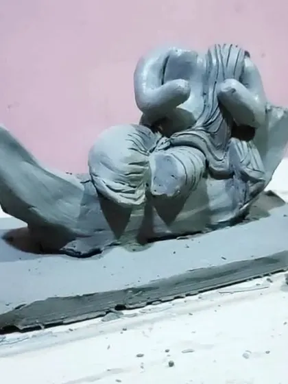A side view of the crescent moon Ganesha, showing the posture and form of the sculpture. I make sure every angle is thoughtfully crafted, as these are three-dimensional art pieces.