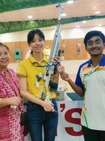 Ankita Chanu with her family and coach after her bronze medal win. We believe family support is a crucial part of a shooter's success.