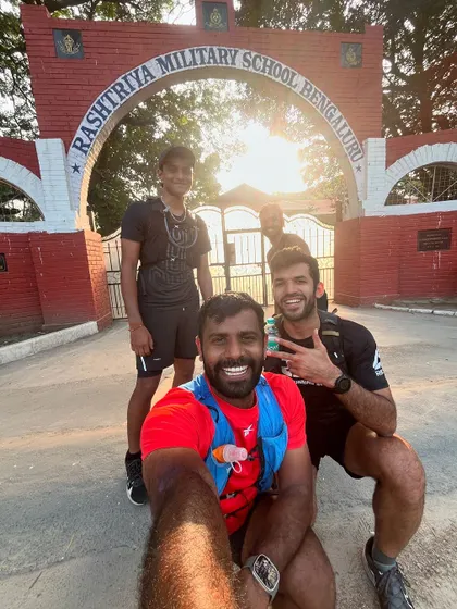A selfie with my running buddies in front of my old school. Sharing a piece of my history with my team.