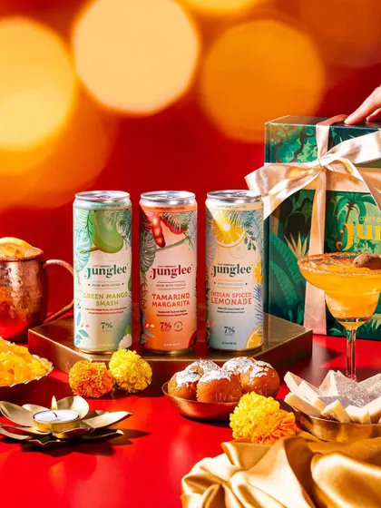 A Diwali-themed festive shot for a beverage brand. We use culturally relevant props like diyas and marigolds to create timely and engaging content.