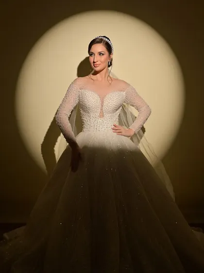 For my brides who dream of a white wedding, I create looks that are ethereal and graceful. This Christian bridal look features soft, romantic makeup and an elegant updo, complementing the beauty of the white gown.