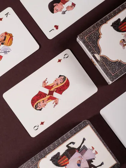 A close-up, detailed shot of the artwork on Namostutay's playing cards. This macro view highlights the quality of the printing and the beauty of the illustrations.