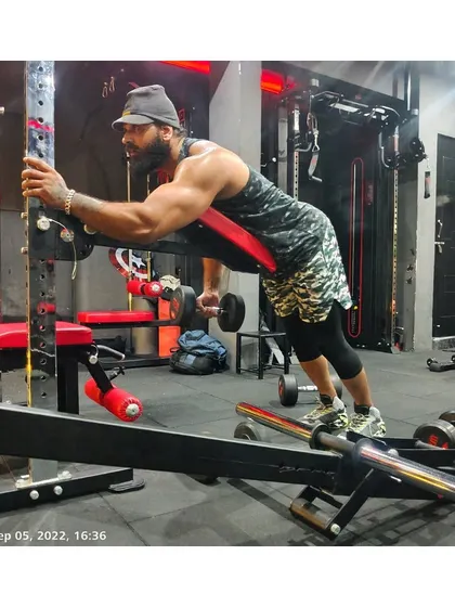 Changes are coming now. Using the Sorinex bulldog pad for a spider curl, an intense variation for isolating the biceps.