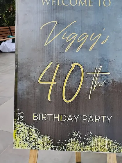 A custom welcome sign for Viggy's 40th birthday party, setting a sophisticated tone for the event.