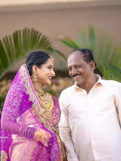 A sweet, smiling moment between Jagruthi and her father.