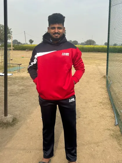 One of our players looking confident and ready in the academy tracksuit. We build not just skills, but also character.