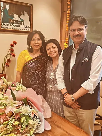 With my sister and brother-in-law at our office opening. Having my siblings fly in to be part of our joyous celebration made the day truly memorable.