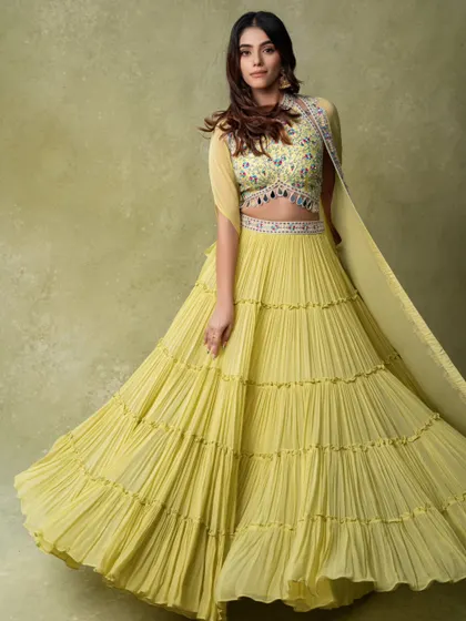A dynamic shot of a flowing yellow lehenga for an e-commerce brand. Capturing movement is key to making the outfit look appealing online.