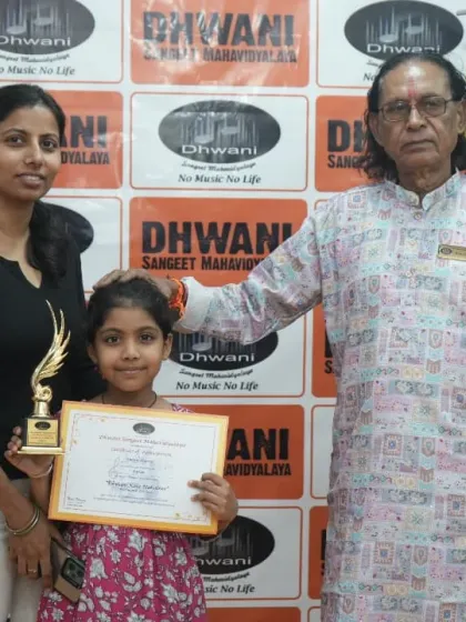 A student with her mother and guru, a happy and proud moment.