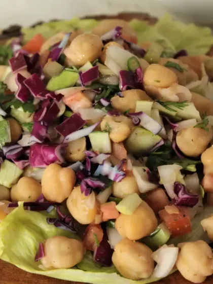 This vibrant chickpea salad is a powerhouse of nutrition. Made with chickpeas, chopped red cabbage, cucumber, and a squeeze of lime, it's a refreshing and filling side dish that helps stabilize energy levels throughout the day.