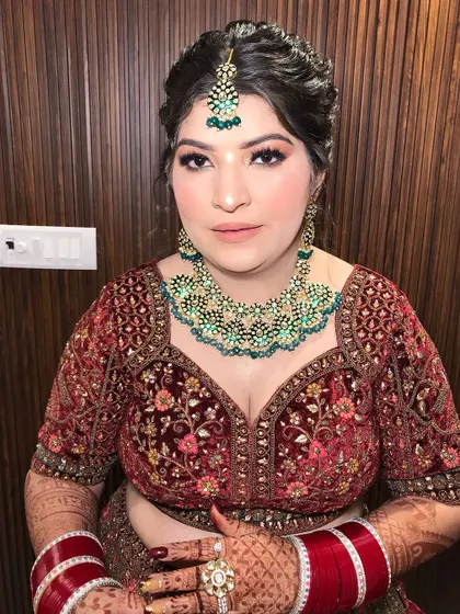 A close-up portrait that shows the flawless, photo-ready finish of the HD makeup.