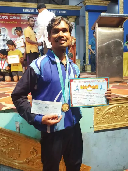 Proudly holding my first prize certificate and medal from the Mysore Dasara competition. Success in these events is a result of rigorous and structured training.