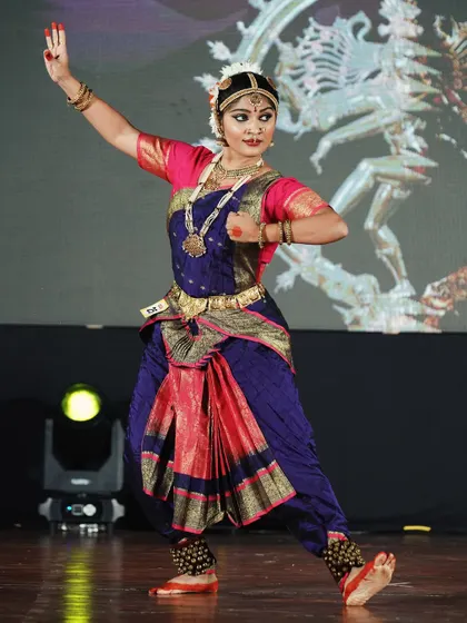 A senior category performer who won 2nd place. Her strong stance and focused expression show her command of the art form.