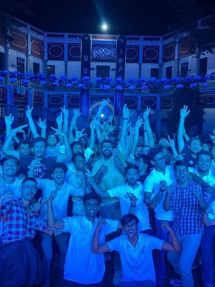A group picture with the energized students of UVCE Bangalore after a memorable show under the full moon.