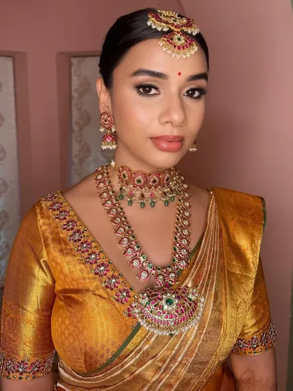 A final look at the bride, showcasing the balance of a strong eye and a soft, complementary lip color.