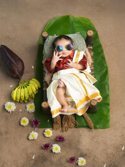 A touch of South Indian swag for this 17-day-old superstar. I enjoy creating unique and playful newborn concepts that reflect your culture and personality.
