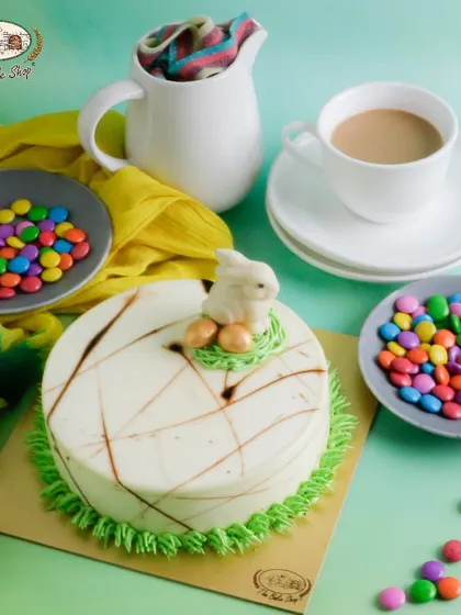 A smaller version of our Oreo Vanilla Easter cake, topped with a single white chocolate bunny. It's a perfect size for a small family gathering.