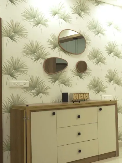 A console table with storage that expands into a full dining table, set against a vibrant palm-print wallpaper.
