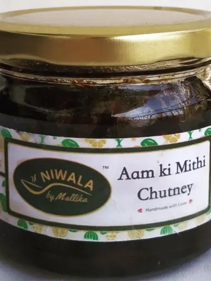 A jar of my Aam ki Mithi Chutney, a perfect blend of sweet and sour. I use organic jaggery for sweetness, which also gives it a beautiful dark colour and rich flavour.