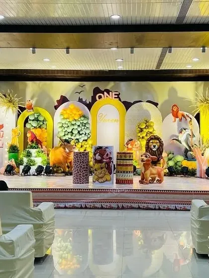 A wide view of the impressive Lion King stage setup. The multi-layered design with various characters creates a rich and dynamic scene.