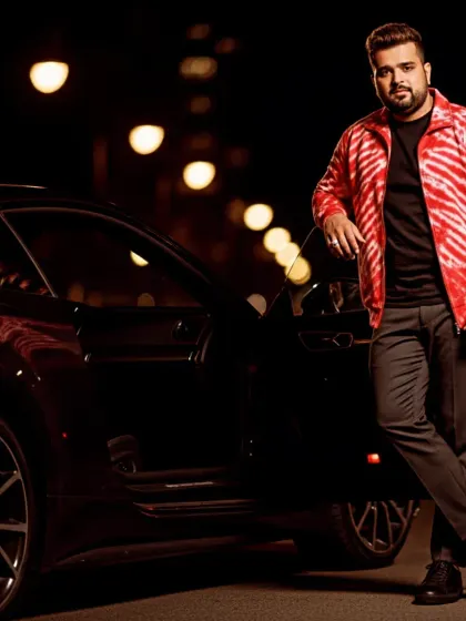A night time photoshoot with a sports car. The city lights and sleek car create a very cool, after dark vibe.