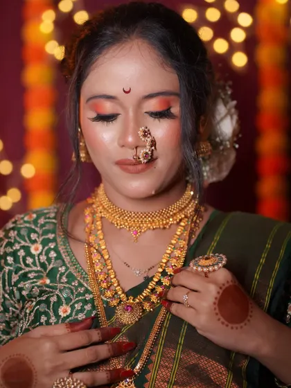The complete look, showcasing the intricate details of the makeup and jewelry. My goal is always to ensure the bride feels confident and beautiful from every angle.