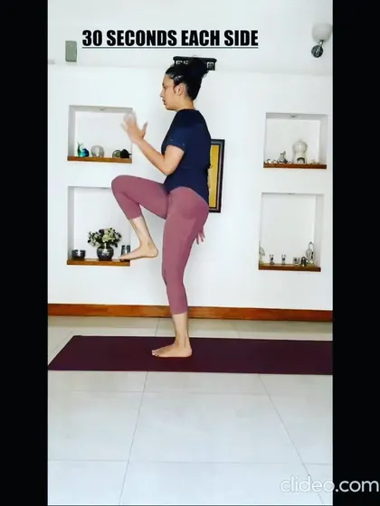 Adding some balance work with high knees. This move not only strengthens the standing leg and hip flexors but also engages your core for stability. We hold for 30 seconds on each side.