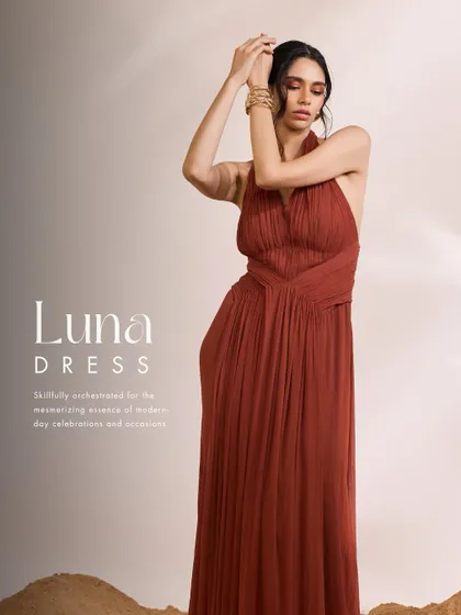 The Luna Dress in a rich rust hue, designed for contemporary sophistication. I used intricate pleating and expert gathering to create a flowing, elegant silhouette with a captivating backless design.