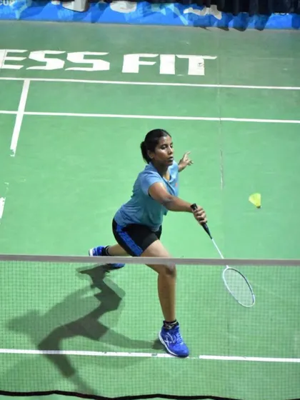 A player executing a forehand shot with precision and power, a fundamental skill honed through countless drills.