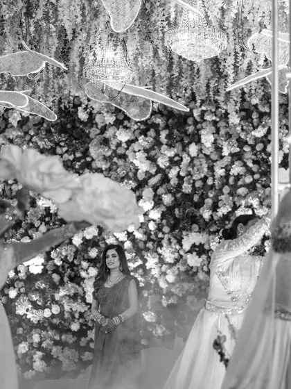 A black and white shot of the bride's reception performance, adding a timeless and artistic feel to the moment.