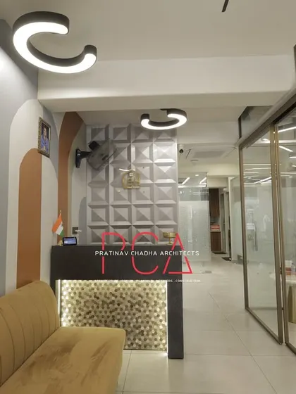 A full view of the reception corridor at StyleIn Homes, showing the path from the entrance to the main office areas.