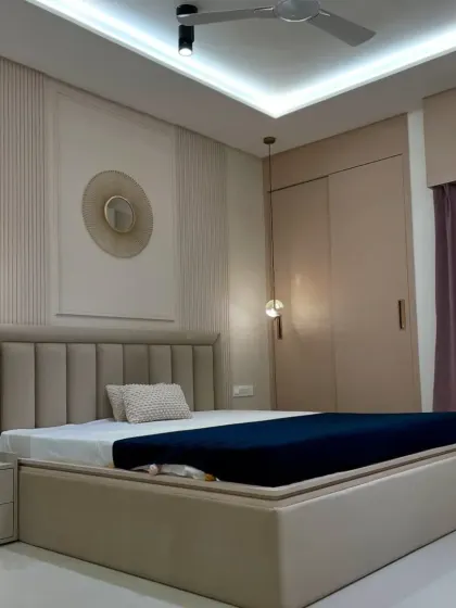 Another view of this modern neutral bedroom, highlighting the clean lines and balanced design. This is a perfect example of our budget-friendly yet premium interior solutions.